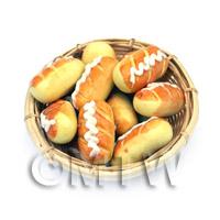1/12th scale - 9 Dolls House Miniature Long Iced Buns In A Large Basket