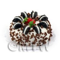 Miniature Iced Cake With Oreo Cookies and Chocolate Fl