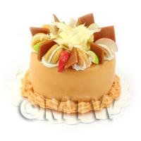 Dolls House Miniature Chocolate Cake With Fruit Slices And White Chocolate