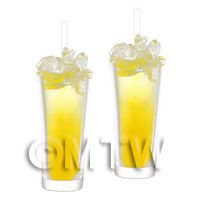 2 Miniature Yellow Bird Cocktails In Long Glasses 