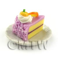 Miniature Purple Iced Individual Orange and Kumquat Cake Slice