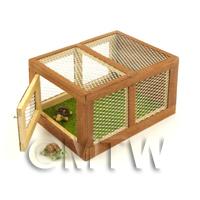 Miniature Wooden Animal Hutch With Front Opening Door And Two Tortoises