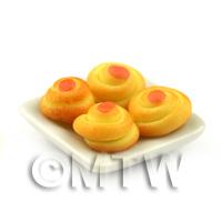 Dolls House Orange Iced Spiral Buns On A Square Plate