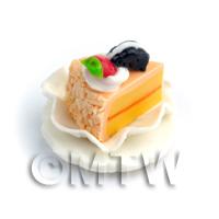Dolls House Miniature Peach Iced  Individual Cake Slice On A Clay Plate