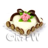 Miniature Square Pink Rose Topped Cake 
