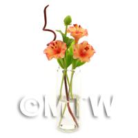 4 Miniature Orange Cut Flowers in a Glass Vase 