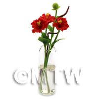 4 Miniature Red Cut Flowers in a Glass Vase 