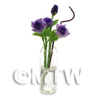 4 Miniature Long Stemmed Purple Roses in a Glass Vase 