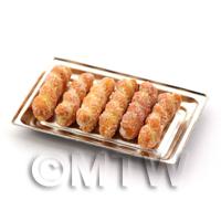 Miniature Sugar Dusted Pastry Twists on an Aluminium tray 
