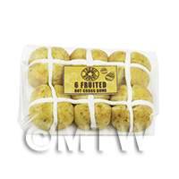 dolls house miniature packet of six hot cross buns with a yellow label