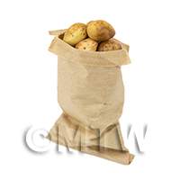 Dolls house miniature paper bag of dirty potatoes 