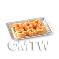 6 Orange Flower Shaped Donuts On A Tray