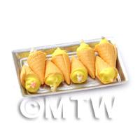 Miniature Yellow  Marshmallow Cones On A Tray