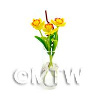3 Miniature Long Yellow Daffodils in a Glass Vase