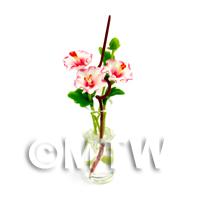 3 Miniature Red And White Open Flowers in a Glass Vase 