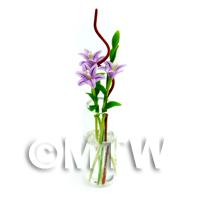 3 Miniature Stargazer Lilies in a Glass Vase 