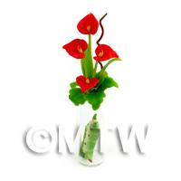 4 Miniature Red Calla Lilies And Caterpillar in a Glass Vase 