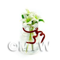 3 Miniature White Stargazer Lilies in a Short Glass Vase 