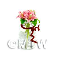 3 Miniature Light Pink Stargazer Lilies in a Short Glass Vase 