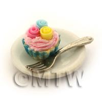 Miniature Fondant 3 Rose Cupcake In A Blue Paper Cup On A Plate With A Fork