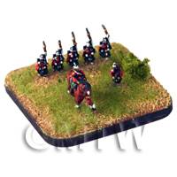 officer and bagpiper at front