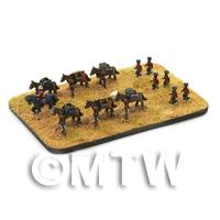 reverse view of pack animals and mountain guns