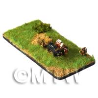 ox cart and handler going through a grassy field