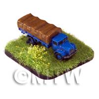 Man 630 lorry painted blue and brown on a grass style base