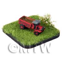 red painted L.G.O.C. B Type Lorry on  grass style base