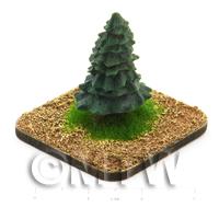 a painted Fir Tree on a grass and earth base