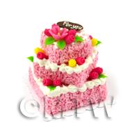 Pink Iced Miniature Square 3 Tier Celebration cake Topped with Candied Fruit