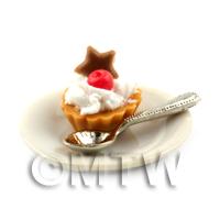 Dolls House Cherry and Chocolate Star Tart on a Plate With a Spoon