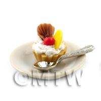 Dolls House Lemon Tart with A Chocolate Fan on a Plate With a Spoon