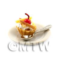 Dolls House Cherry and Chocolate Tart on a Plate With a Spoon
