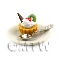 Dolls House Kiwi and Cherry Tart on a Plate With a Spoon
