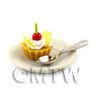 Dolls House Lemon and Cherry Tart on a Plate With a Spoon