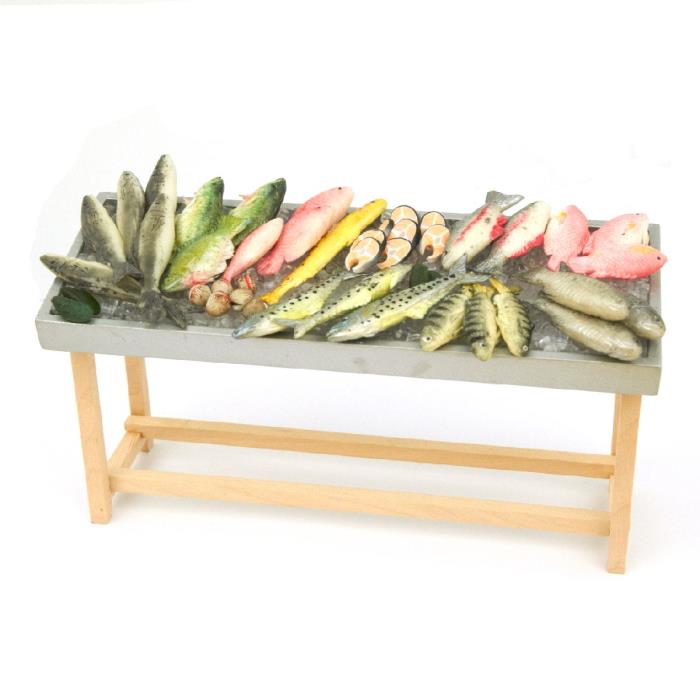 Fish counter with lots of ice and fish