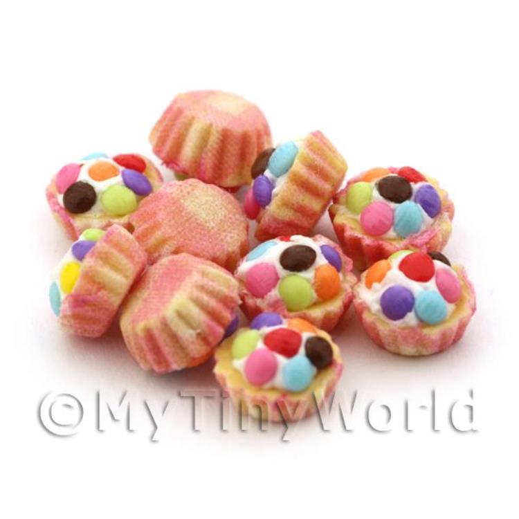 Miniature Spartie Topped Cupcake With Pink And Yellow Paper Cup